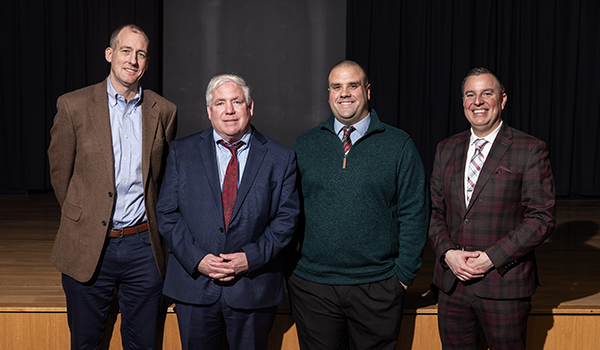 Wyant (left to right) joined City Councilmember Mike Driscoll '82, and Franklin Towne Charter High School's criminal justice teacher Michael Murphy '11 who originated the idea, and Chief of Staff/Office of Advancement Vincent Wisniewski, '03, M.A.'08. 