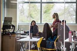 Professor with students in a classroom