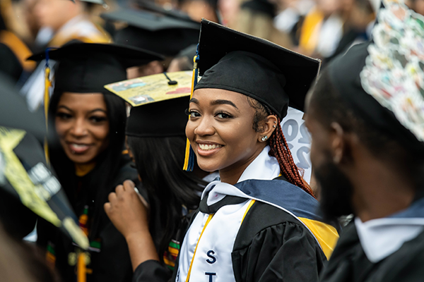 Image of students in their graduation regalia. 