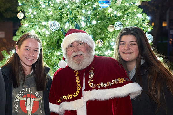 Image of students and Santa Claus at the tree lighting.
