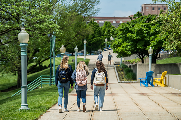 Image of students walking around campus.