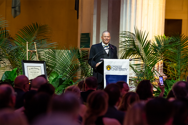 Last year’s Charter Dinner, honoring Jeffrey Boyle, ’88, CPA, of PwC (at podium), raised more than $350,000 to support student scholarships, a single-year record.