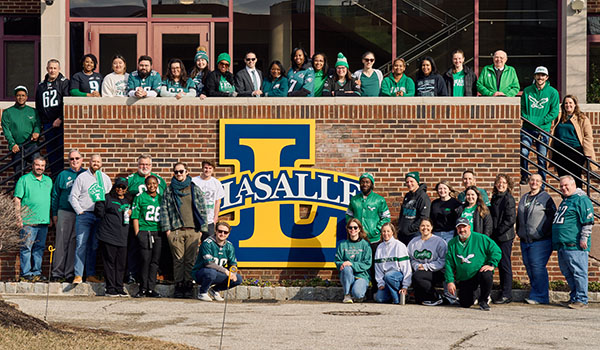 Image of La Salle faculty and staff in Eagles gear Image of La Salle faculty and staff in Eagles gear