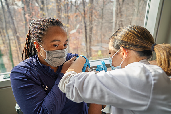 A student receiving the vaccine at La Salle's on-campus clinic.