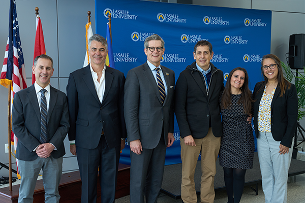 The agreement-signing ceremony at La Salle.