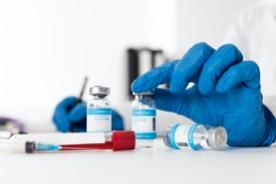 Vaccine vials on lab tabletop